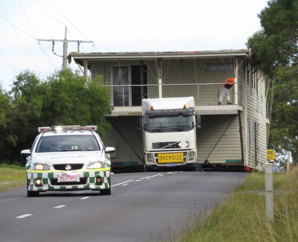Two-storey house on truck with VicRoads pilot escort
